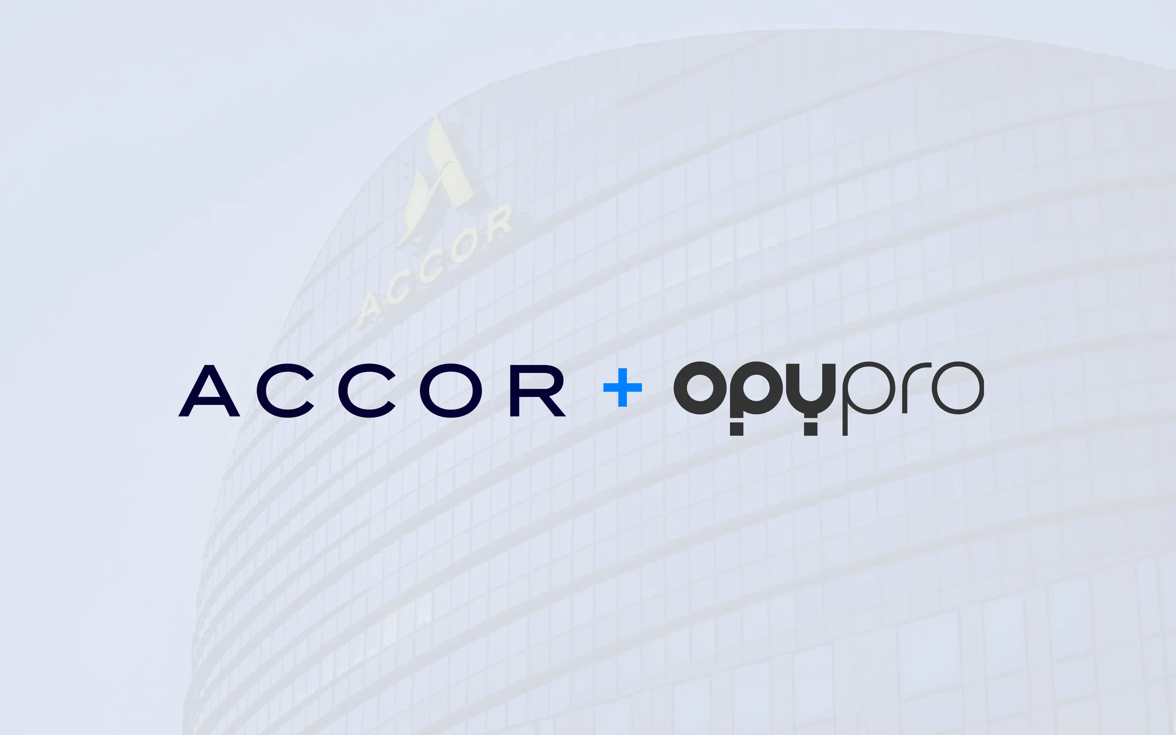 Accor and Opypro logos over the Accor headquarters building